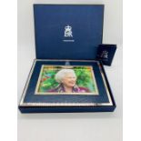 A 2006 Royal Household Christmas gift of a framed photograph of Queen Elizabeth II in original box.