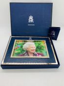 A 2006 Royal Household Christmas gift of a framed photograph of Queen Elizabeth II in original box.