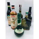 A selection of six bottles to include a Fernet-Branca Diqestif, Crème de Menthe Sebar Absinth, a