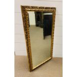 A gilt framed bevelled mirror