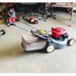 A Honda easy start I2Y lawn mower