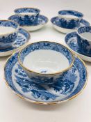 Six English tea cups and saucers in a willow pattern circa 1790.