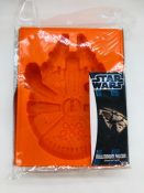 A Star Wars Millennium Falcon ice or jelly mould.