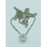 An 18ct white gold diamond pendant necklace of over 1ct