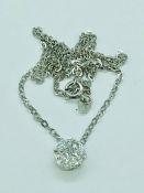 An 18ct white gold diamond pendant necklace of over 1ct