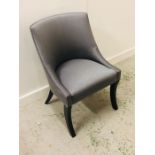 A Contemporary grey upholstered chair