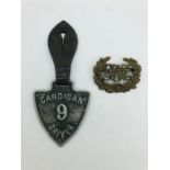 A Cardigan bus driver badge and a GWR badge