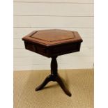 A mahogany six sided side, occasional table with two small drawers (H60cm W44cm D60cm)