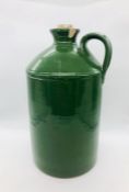 A rare Ink flagon, stoneware, in green.