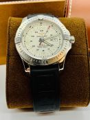 A Breitling Colt Gents watch in original box with original papers.