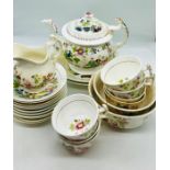 A selection of beautifully decorated china bearing a makers mark consisting of a laurel wreath