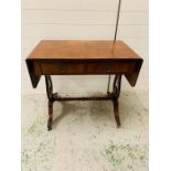 Regency style mahogany sofa table with drop down sides