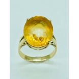 A 14ct yellow gold set ring with a large citrine stone