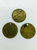 Three gaming tokens dated 1768 and 1790.