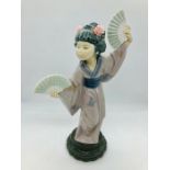 A Lladro figure of an oriental lady with two fans