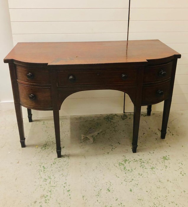 A Large bow front,cellarette Georgian mahogany serving sideboard.