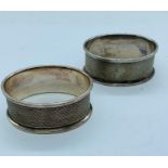 A pair of hallmarked silver napkin rings