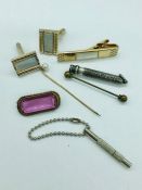A small selection of various items of jewellery including brooch, cuff links etc.