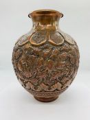 A Persian Copper Vase.