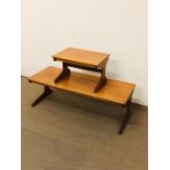A vintage teak portwood furniture ltd mid century coffee table with matching side table