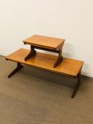 A vintage teak portwood furniture ltd mid century coffee table with matching side table