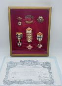 A framed Red Cross Service enamel medals