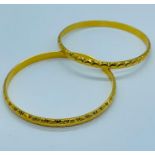 A pair of 22ct yellow gold bangles (24.4g)