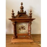 An eight day mantle clock in oak
