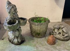 A selection of four garden ornaments and pots