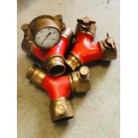 Three Vintage Brass Fire Brigade Hose Couplings one with a gauge.