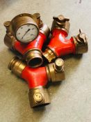 Three Vintage Brass Fire Brigade Hose Couplings one with a gauge.
