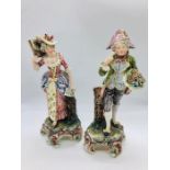 Two Figurines, hand painted, circa 1910 French Majolica bases with floral ornamentation