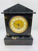A slate mantel clock AF