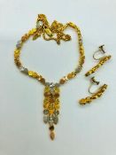 A 9ct three colour gold necklace and earring set (23.4g)