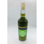 A bottle of L. Garnier Chartreuse
