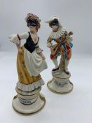 Two figurines one of Arlecchino and one of Columbina