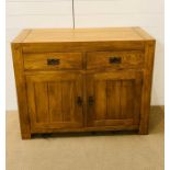 A solid oak rustic farm house sideboard (H86cm W110cm D 50cm)