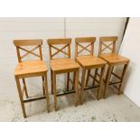 Four pine bar stools with crossbanded backs
