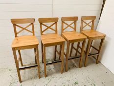 Four pine bar stools with crossbanded backs