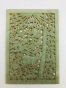 A Chinese Jade tile with a woodland theme.