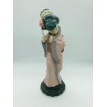 A Lladro figure of a Japanese lady with a fan