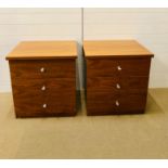 A pair of bedside tables, wood effect with three soft closing drawers