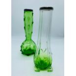 Two green art glass bud vases, one with a hallmarked silver rim