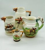 A selection of hunting themed pottery jugs, three by Keele Street Pottery and one by Wedgwood