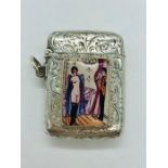 A silver vesta case with enamel plaque