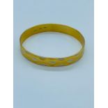 A 22ct gold bangle (24.76g)