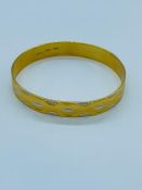 A 22ct gold bangle (24.76g)