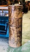 Large metal storage drum container with a copper coloured patina thought to be used to store coats