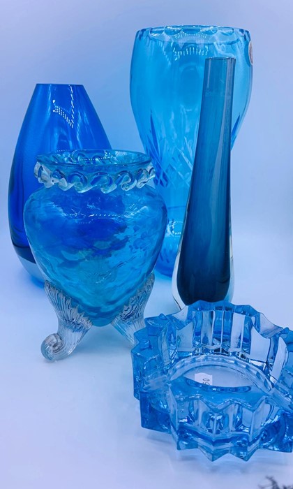 A selection of blue art glass of various shapes