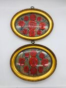 A collection of Antique wax seals in oval frames.